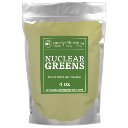 Image of Remedy's Nutrition® Nuclear Greens™ Powder Dietary Supplement front bottle. Made in USA. Spirulina, Spinach, Carrot.